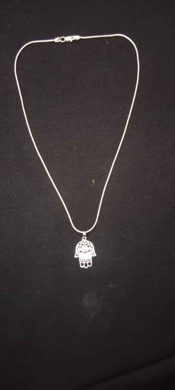 Hamsa hand hanging, evil eye charm, home decor, car charm, spiritual protection, ward off evil, blue evil eye, handmade charm, positive energy decor, boho wall hanging, good luck amulet, protective jewelry, talisman for home, meaningful gift idea.