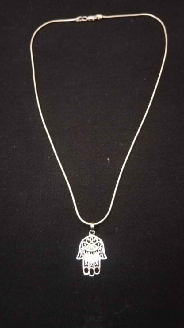 Hamsa hand hanging, evil eye charm, home decor, car charm, spiritual protection, ward off evil, blue evil eye, handmade charm, positive energy decor, boho wall hanging, good luck amulet, protective jewelry, talisman for home, meaningful gift idea.