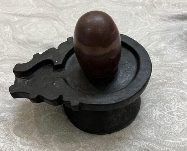 Narmadeshwar Shivling, Narmadeshwar Shivling for home, natural Narmadeshwar Shivling, original Narmadeshwar Shivling, Shivling for puja, Narmada Shivling, vastu remedy Shivling, buy Shivling online, Narmadeshwar Shivling benefits, sacred shivling stone, authentic Narmada Shivling
