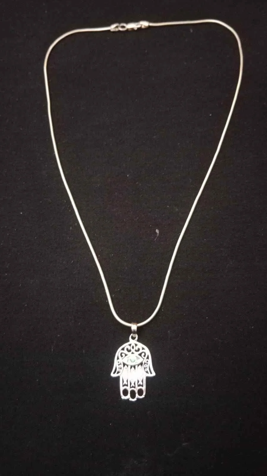 Hamsa hand hanging, evil eye charm, home decor, car charm, spiritual protection, ward off evil, blue evil eye, handmade charm, positive energy decor, boho wall hanging, good luck amulet, protective jewelry, talisman for home, meaningful gift idea.